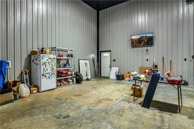 1972 Anderson Hollow Rd, Linn Creek, MO 65052 - garage featuring freestanding refrigerator