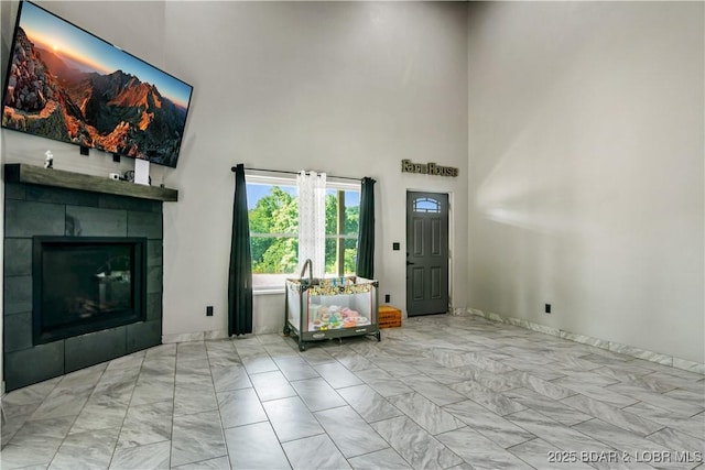 1972 Anderson Hollow Rd, Linn Creek, MO 65052 - foyer entrance with a high ceiling, a tiled fireplace, and marble finish floors