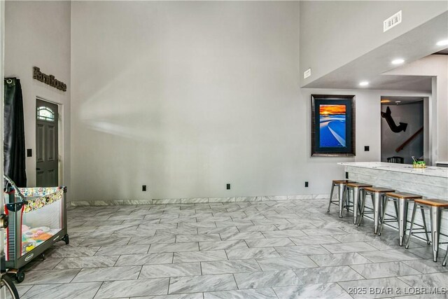 1972 Anderson Hollow Rd, Linn Creek, MO 65052 - living room with a high ceiling and marble look tiles