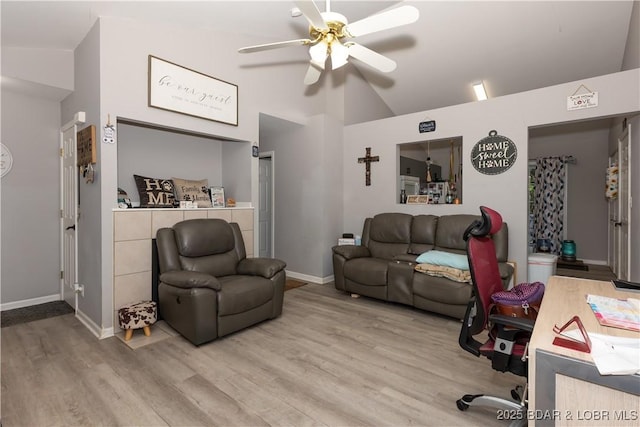 152 Pawnee Rd, Lake Ozark, MO 65049 - living room featuring a ceiling fan, light wood-style floors, and high vaulted ceiling