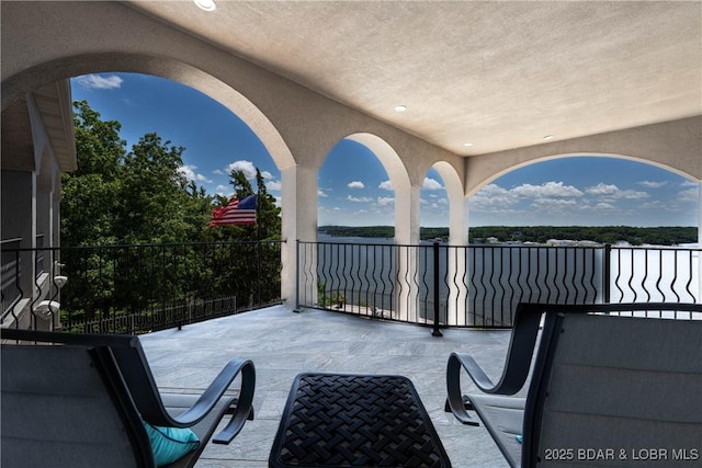 348 Cedar Crest Dr, Lake Ozark, MO 65049 - patio / terrace with a water view
