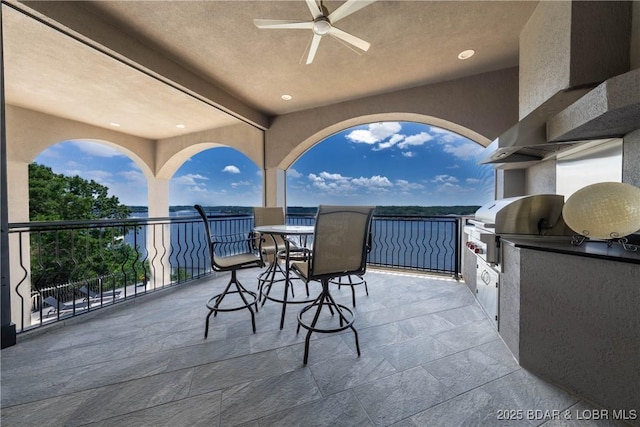 348 Cedar Crest Dr, Lake Ozark, MO 65049 - patio / terrace featuring area for grilling and a ceiling fan
