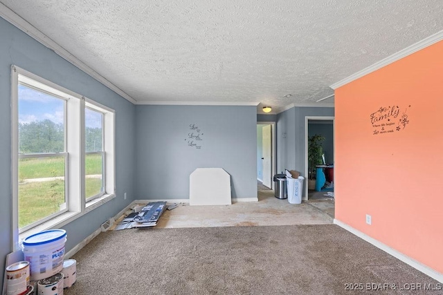 1123 Woodland Dr, Eldon, MO 65026 - carpeted spare room featuring a textured ceiling and ornamental molding