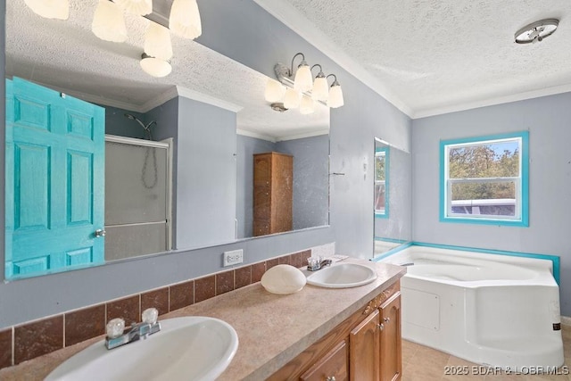 1123 Woodland Dr, Eldon, MO 65026 - bathroom featuring a textured ceiling, a stall shower, a bath, double vanity, and tile patterned flooring