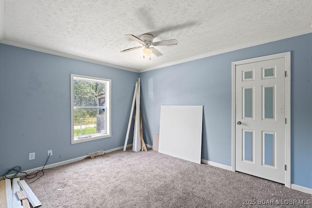 1123 Woodland Dr, Eldon, MO 65026 - carpeted empty room featuring ornamental molding, ceiling fan, and a textured ceiling