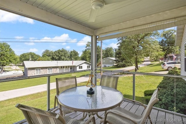 1150 Georgene Rd, Camdenton, MO 65020 - sunroom / solarium with ceiling fan, outdoor dining area, and healthy amount of natural light