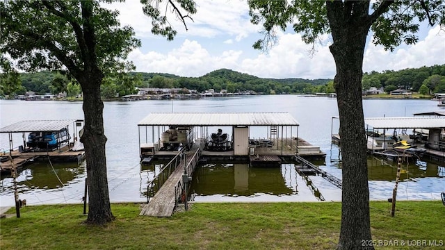 57 Ke Jo Point Rd, Gravois Mills, MO 65037 - dock area featuring a water view, boat lift, and a wooded view