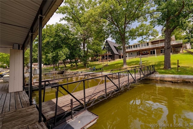 57 Ke Jo Point Rd, Gravois Mills, MO 65037 - dock area featuring a water view and a lawn