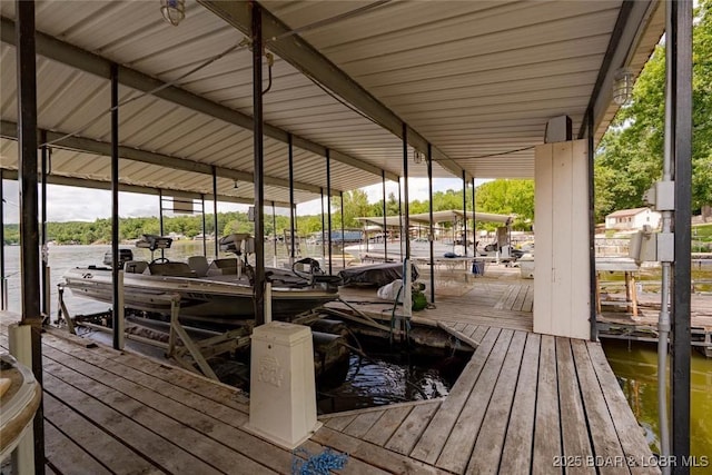 57 Ke Jo Point Rd, Gravois Mills, MO 65037 - dock area with boat lift and a water view