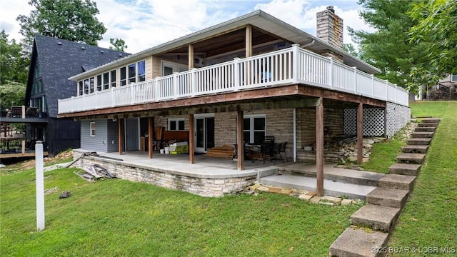 57 Ke Jo Point Rd, Gravois Mills, MO 65037 - back of house featuring a yard, a patio area, a deck, and a chimney