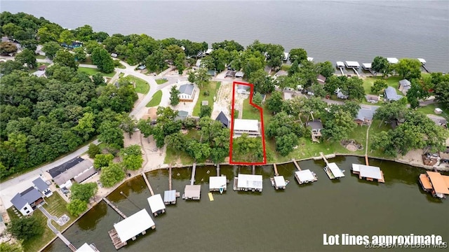 57 Ke Jo Point Rd, Gravois Mills, MO 65037 - aerial perspective of suburban area with a nearby body of water and property boundaries highlighted