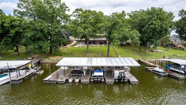 57 Ke Jo Point Rd, Gravois Mills, MO 65037 - dock area featuring boat lift, a water view, and a lawn