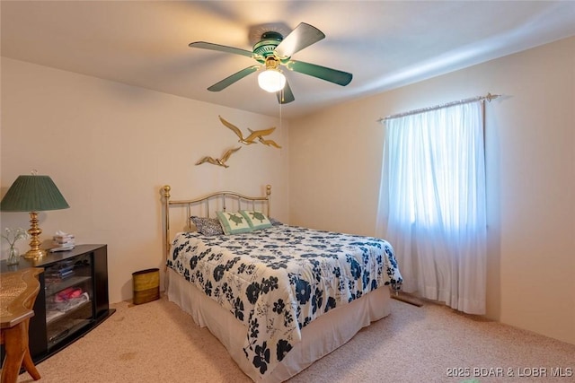 57 Ke Jo Point Rd, Gravois Mills, MO 65037 - bedroom featuring light colored carpet and ceiling fan