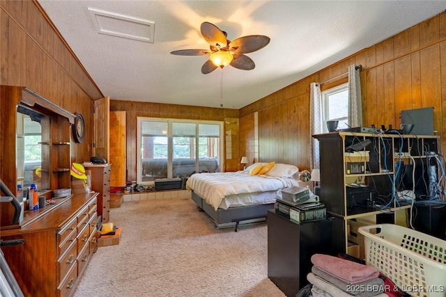 57 Ke Jo Point Rd, Gravois Mills, MO 65037 - bedroom featuring wood walls, carpet floors, and ceiling fan