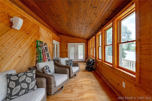 57 Ke Jo Point Rd, Gravois Mills, MO 65037 - living area with lofted ceiling, wooden walls, wooden ceiling, french doors, and light wood-style flooring