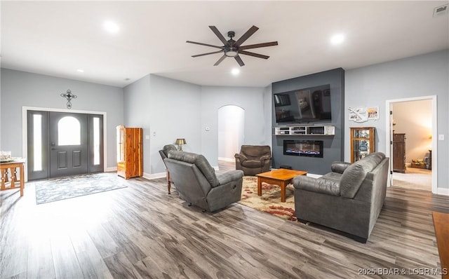 432 Cornett Branch Rd, Four Seasons, MO 65049 - living area with arched walkways, ceiling fan, wood finished floors, and recessed lighting