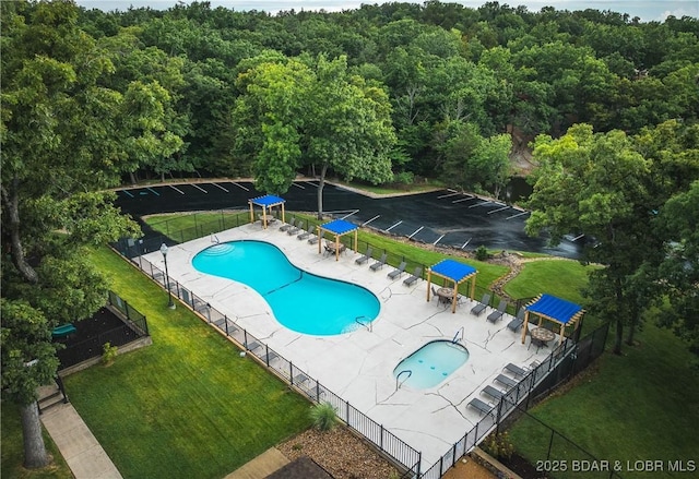432 Cornett Branch Rd, Four Seasons, MO 65049 - community pool featuring a wooded view and a patio