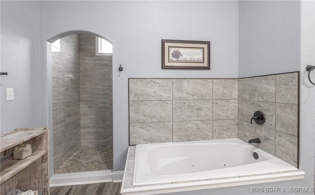 432 Cornett Branch Rd, Four Seasons, MO 65049 - bathroom featuring a jetted tub, wood finished floors, and a shower