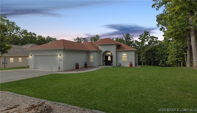 432 Cornett Branch Rd, Four Seasons, MO 65049 - mediterranean / spanish-style home with a garage, concrete driveway, a front lawn, and stucco siding