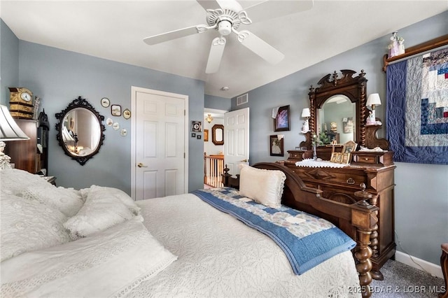 1008 Beacon Ridge Dr, Lake Ozark, MO 65049 - carpeted bedroom featuring a ceiling fan and baseboards