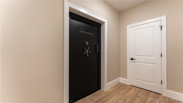 1254 Darwin Dr, Osage Beach, MO 65065 - hall with light wood-type flooring and baseboards