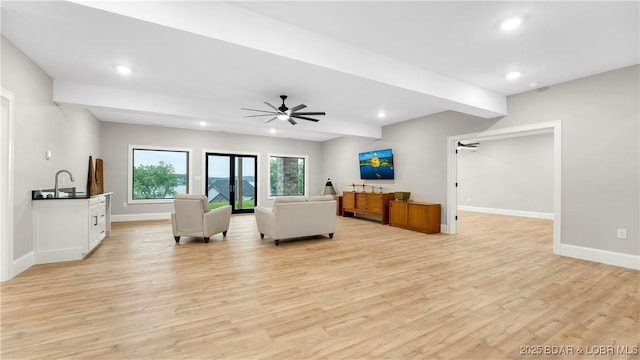 1254 Darwin Dr, Osage Beach, MO 65065 - living room featuring recessed lighting, light wood finished floors, and ceiling fan