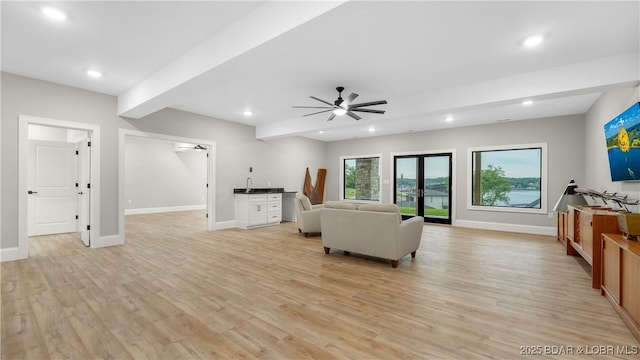 1254 Darwin Dr, Osage Beach, MO 65065 - living room with a ceiling fan, recessed lighting, and light wood finished floors