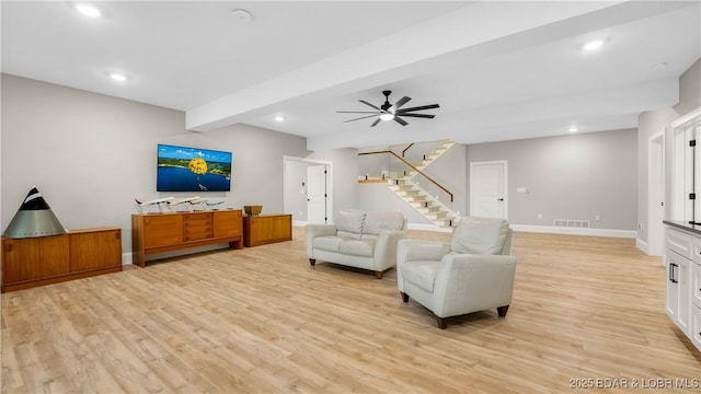1254 Darwin Dr, Osage Beach, MO 65065 - living room featuring light wood finished floors, a ceiling fan, recessed lighting, and stairs