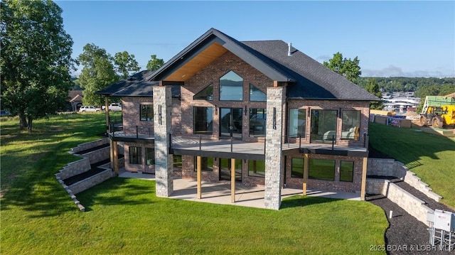 1254 Darwin Dr, Osage Beach, MO 65065 - back of house featuring a patio area, a yard, and stone siding