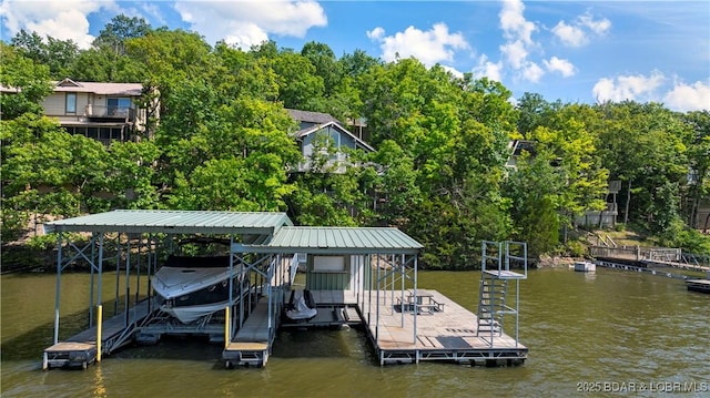541 Elbow Cay Dr, Osage Beach, MO 65065 - dock with boat lift, a water view, and view of wooded area