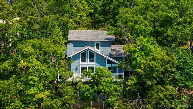 541 Elbow Cay Dr, Osage Beach, MO 65065 - back of property with a wooded view