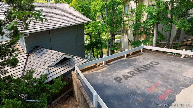 541 Elbow Cay Dr, Osage Beach, MO 65065 - exterior view of parking, gutters, and a downspout