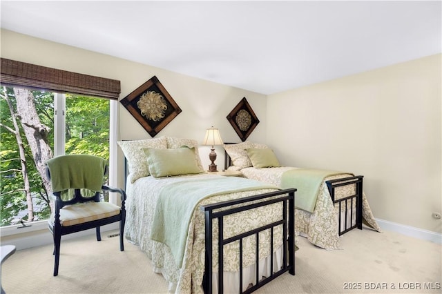 541 Elbow Cay Dr, Osage Beach, MO 65065 - bedroom with light colored carpet and baseboards