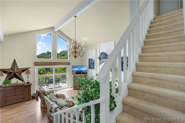 541 Elbow Cay Dr, Osage Beach, MO 65065 - staircase featuring high vaulted ceiling, wood finished floors, beamed ceiling, and a chandelier