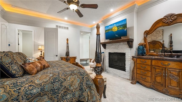 1453 Grand View Dr, Porto Cima, MO 65079 - bedroom with ornamental molding, light colored carpet, a fireplace, and ceiling fan