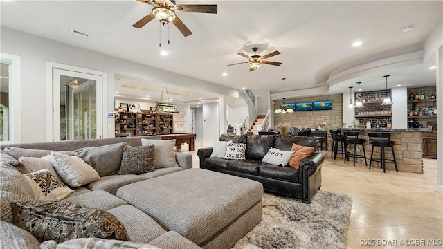 1453 Grand View Dr, Porto Cima, MO 65079 - living area with bar, a ceiling fan, stairs, light tile patterned floors, and recessed lighting