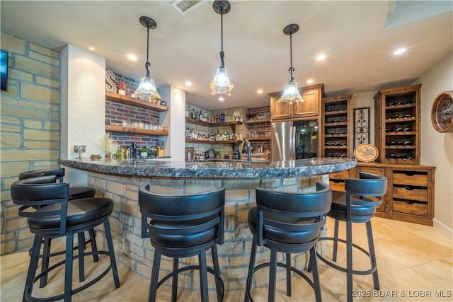 1453 Grand View Dr, Porto Cima, MO 65079 - indoor wet bar with freestanding refrigerator, recessed lighting, light tile patterned flooring, and pendant lighting