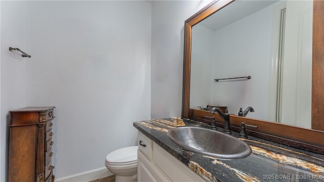 1453 Grand View Dr, Porto Cima, MO 65079 - half bathroom featuring vanity and toilet