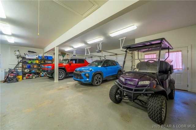 1453 Grand View Dr, Porto Cima, MO 65079 - garage with a garage door opener