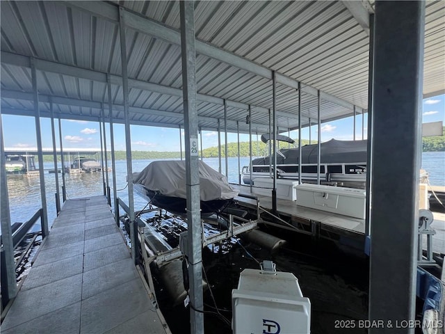 575 Park Place Dr Unit 2B, Kaiser, MO 65047 - dock featuring boat lift and a water view