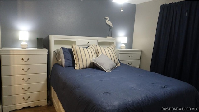 575 Park Place Dr Unit 2B, Kaiser, MO 65047 - bedroom featuring wood finished floors