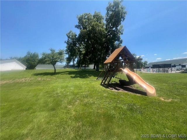 575 Park Place Dr Unit 2B, Kaiser, MO 65047 - view of playground featuring a yard