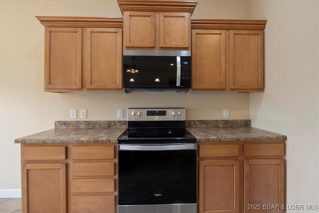 267 Cornett Branch Rd, Four Seasons, MO 65049 - kitchen with stainless steel appliances and dark countertops