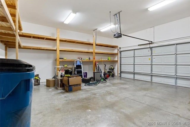 267 Cornett Branch Rd, Four Seasons, MO 65049 - garage featuring a garage door opener