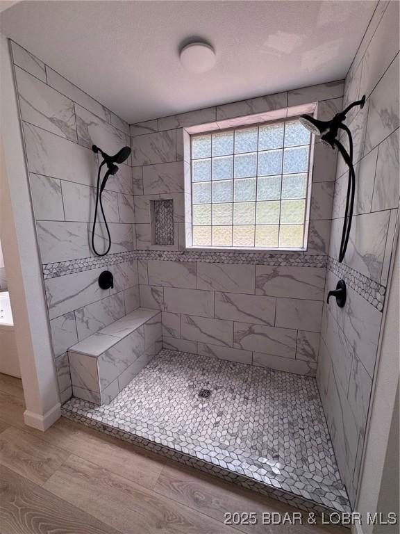 1378 Full Gallop Ln, Roach, MO 65787 - full bathroom with a tile shower and wood finished floors