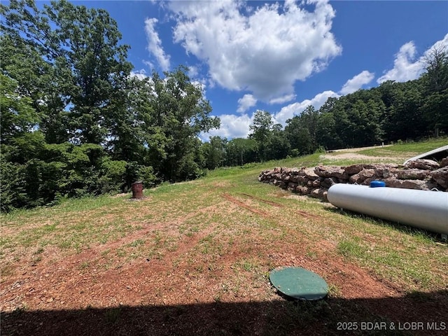 1378 Full Gallop Ln, Roach, MO 65787 - view of yard with a forest view