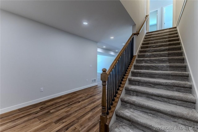 312 Woodland Pt, Linn Creek, MO 65052 - stairs featuring wood finished floors and recessed lighting