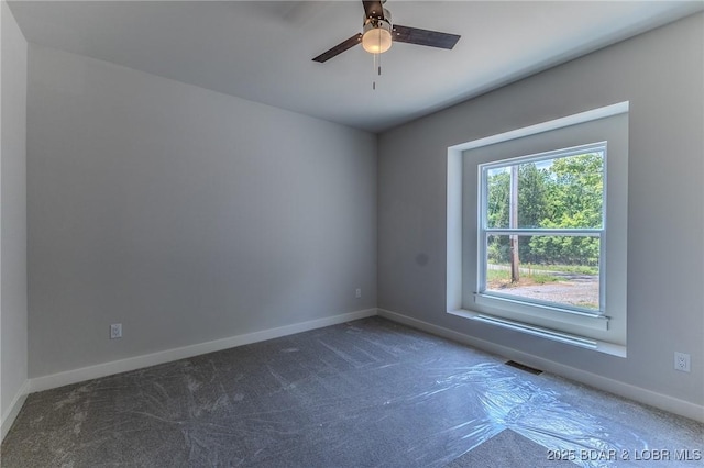 312 Woodland Pt, Linn Creek, MO 65052 - spare room with carpet floors and a ceiling fan