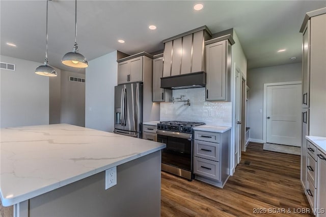 312 Woodland Pt, Linn Creek, MO 65052 - kitchen featuring stainless steel appliances, gray cabinets, decorative backsplash, dark wood-style flooring, and light stone countertops