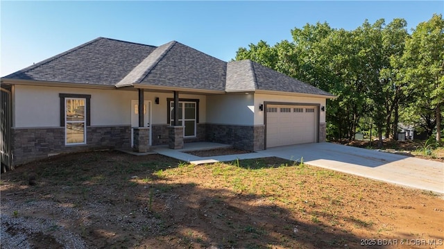 25 Sam Dr, Kaiser, MO 65047 - view of front of home featuring stucco siding, stone siding, a shingled roof, and an attached garage